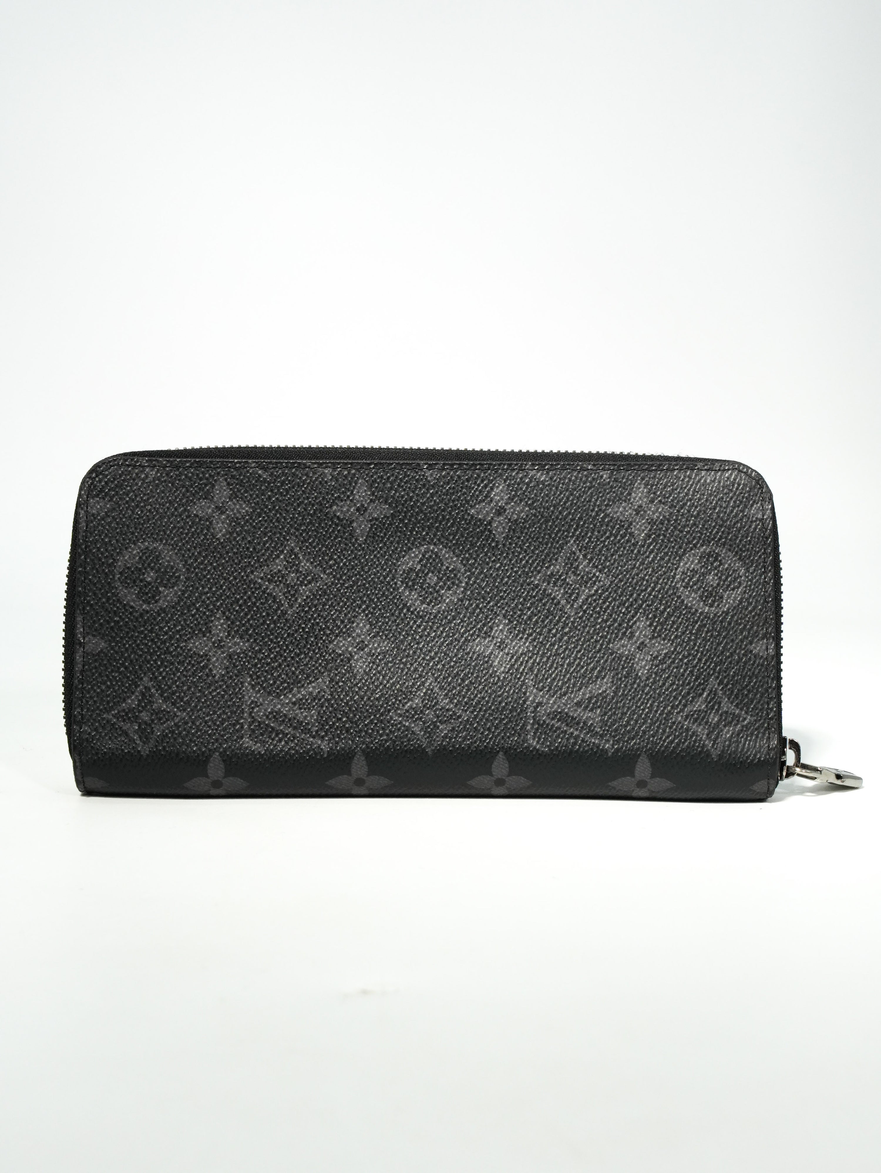 Louis Vuitton Portafoglio Vertical Monogram Eclipse – Guerra Vintage