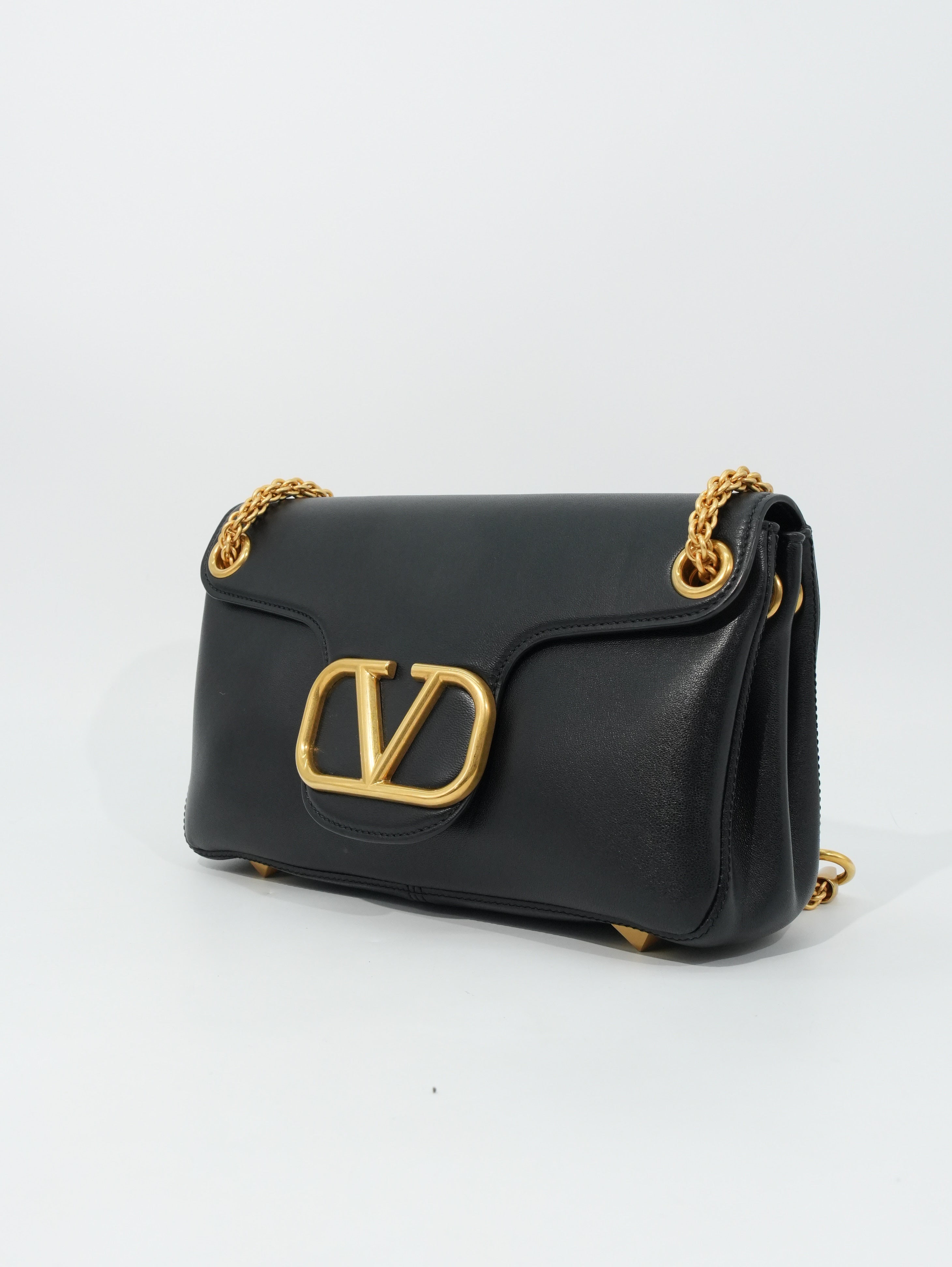 Valentino Stud Sign in Pelle