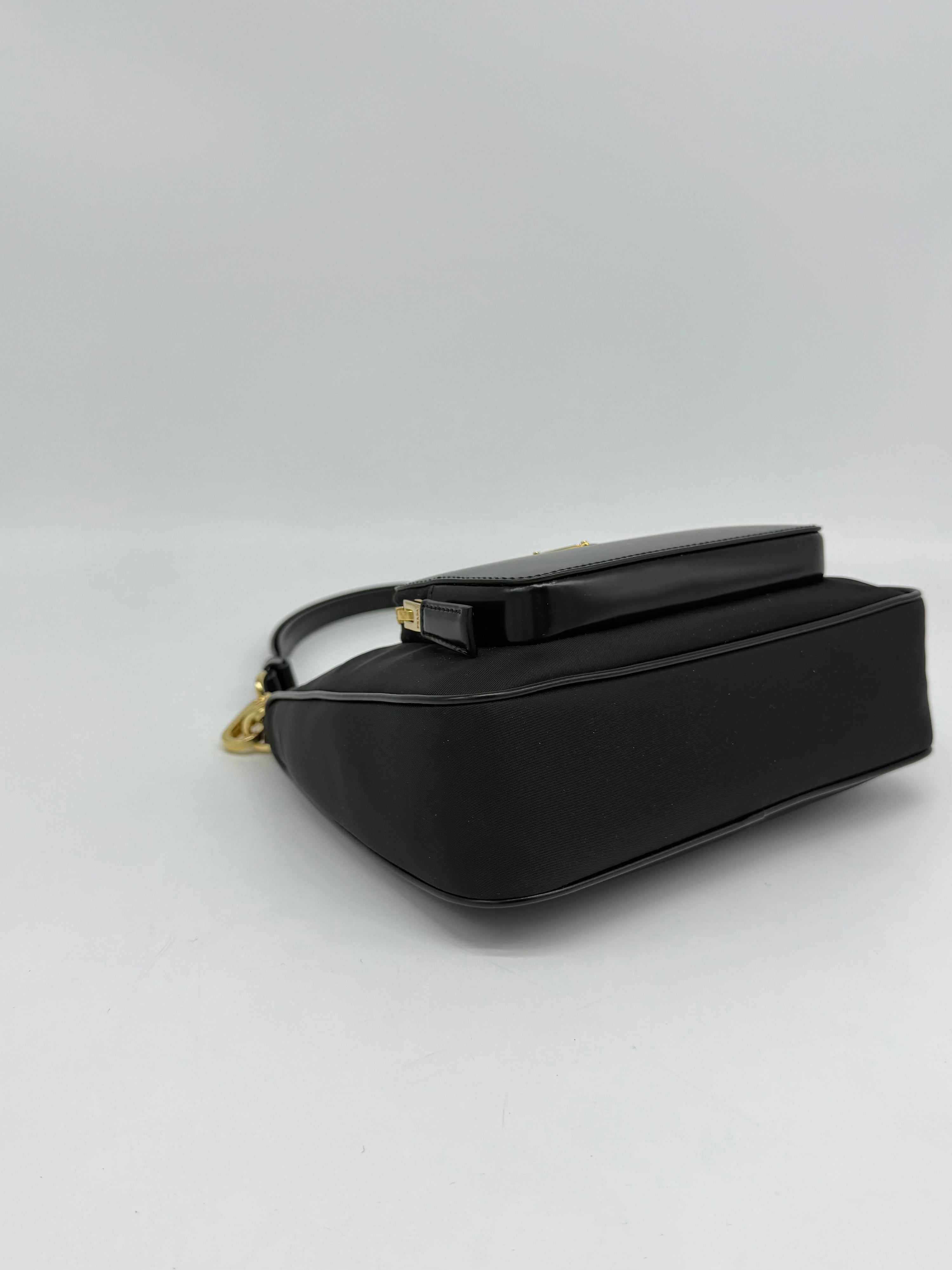 Prada Re-Edition Nylon e Pelle