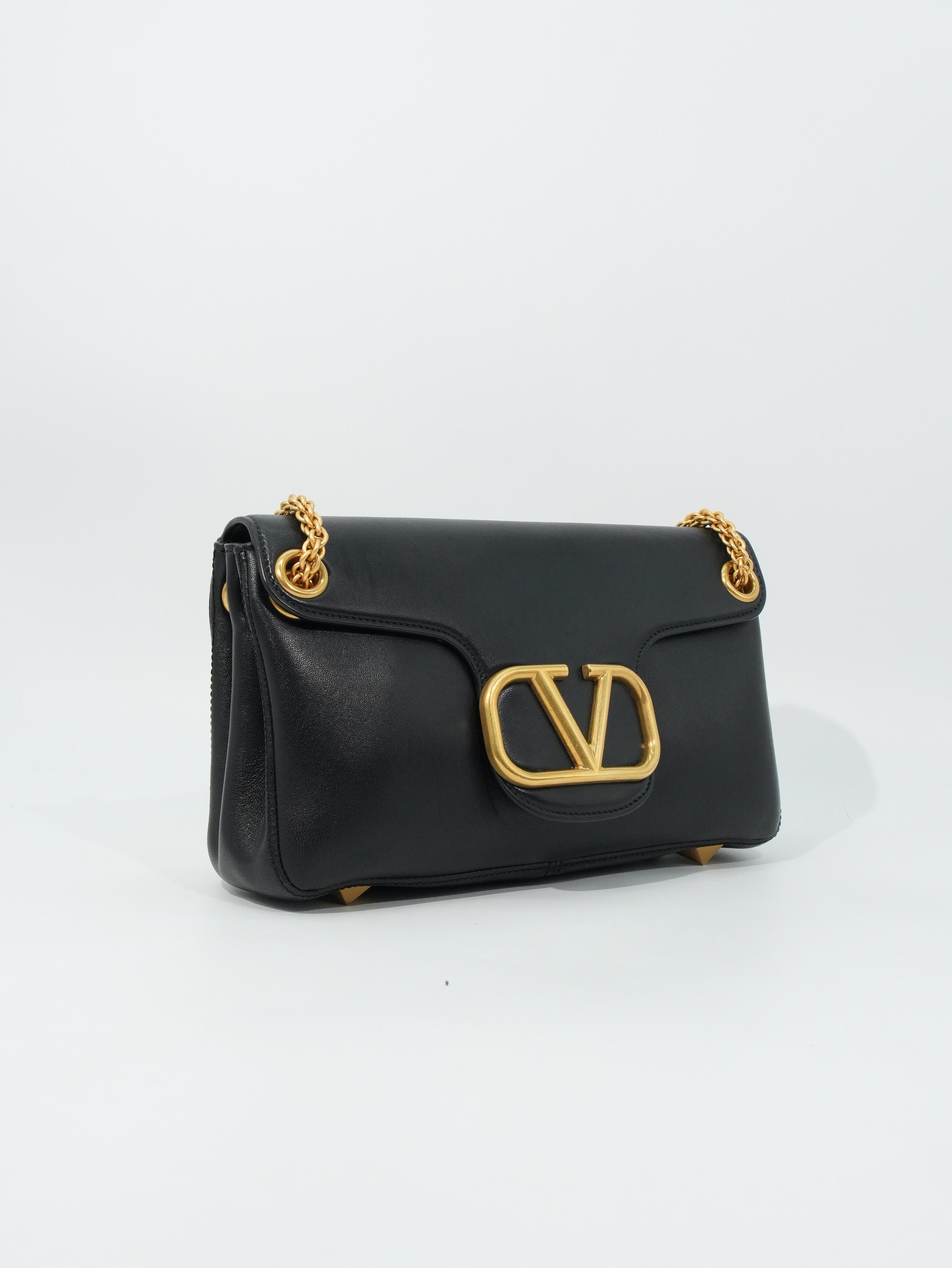 Valentino Stud Sign in Pelle