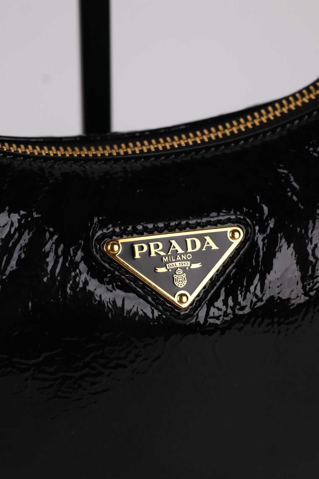 Prada Arqué in Pelle Verniciata