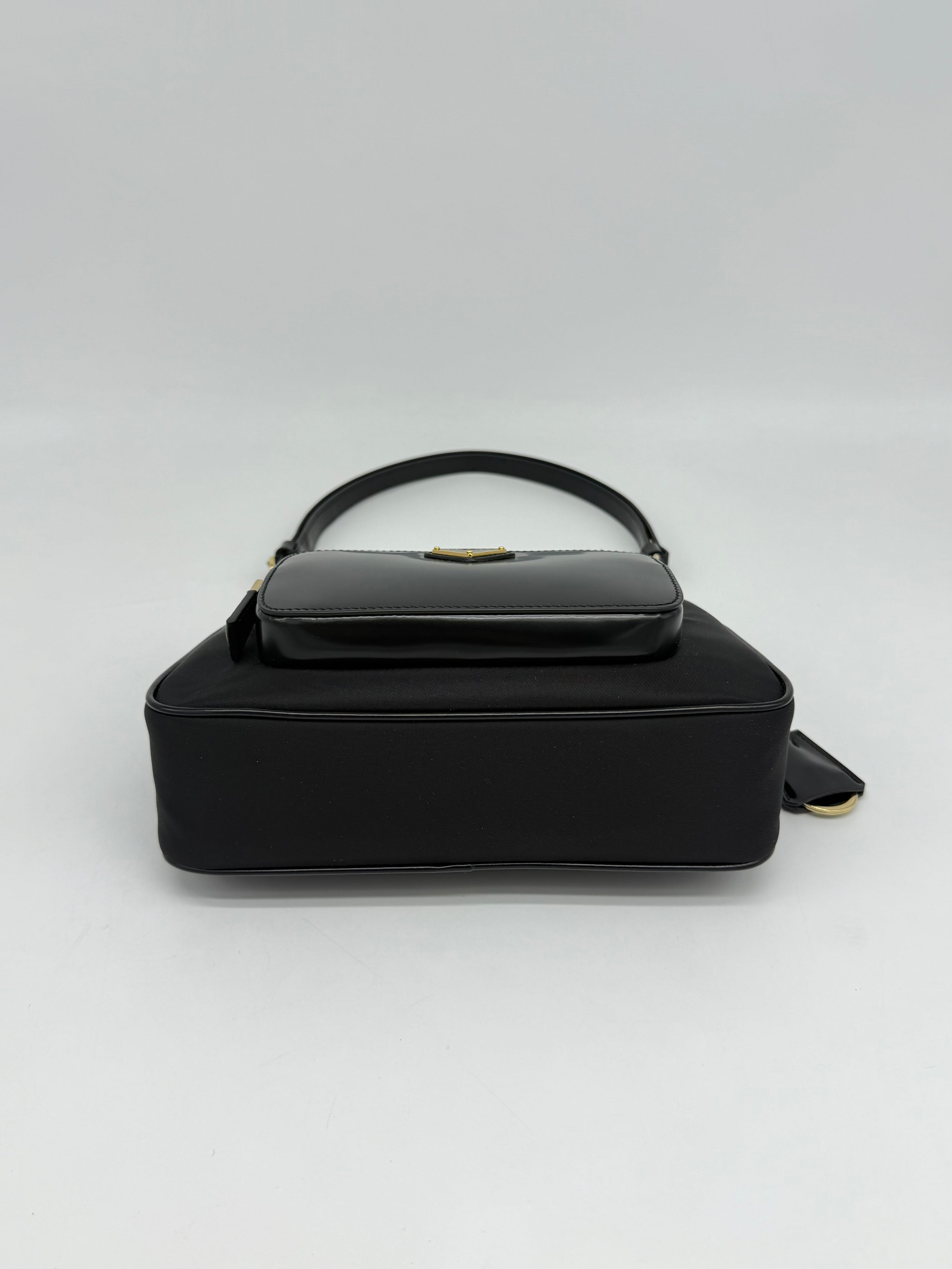 Prada Re-Edition Nylon e Pelle