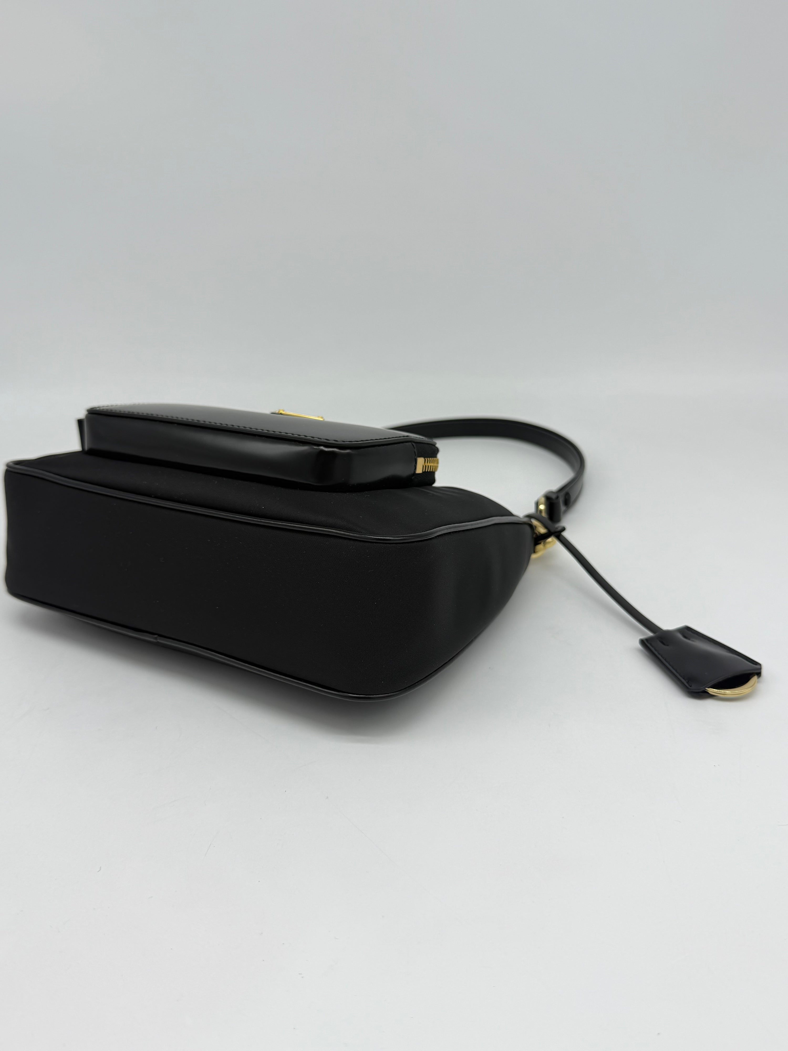Prada Re-Edition Nylon e Pelle
