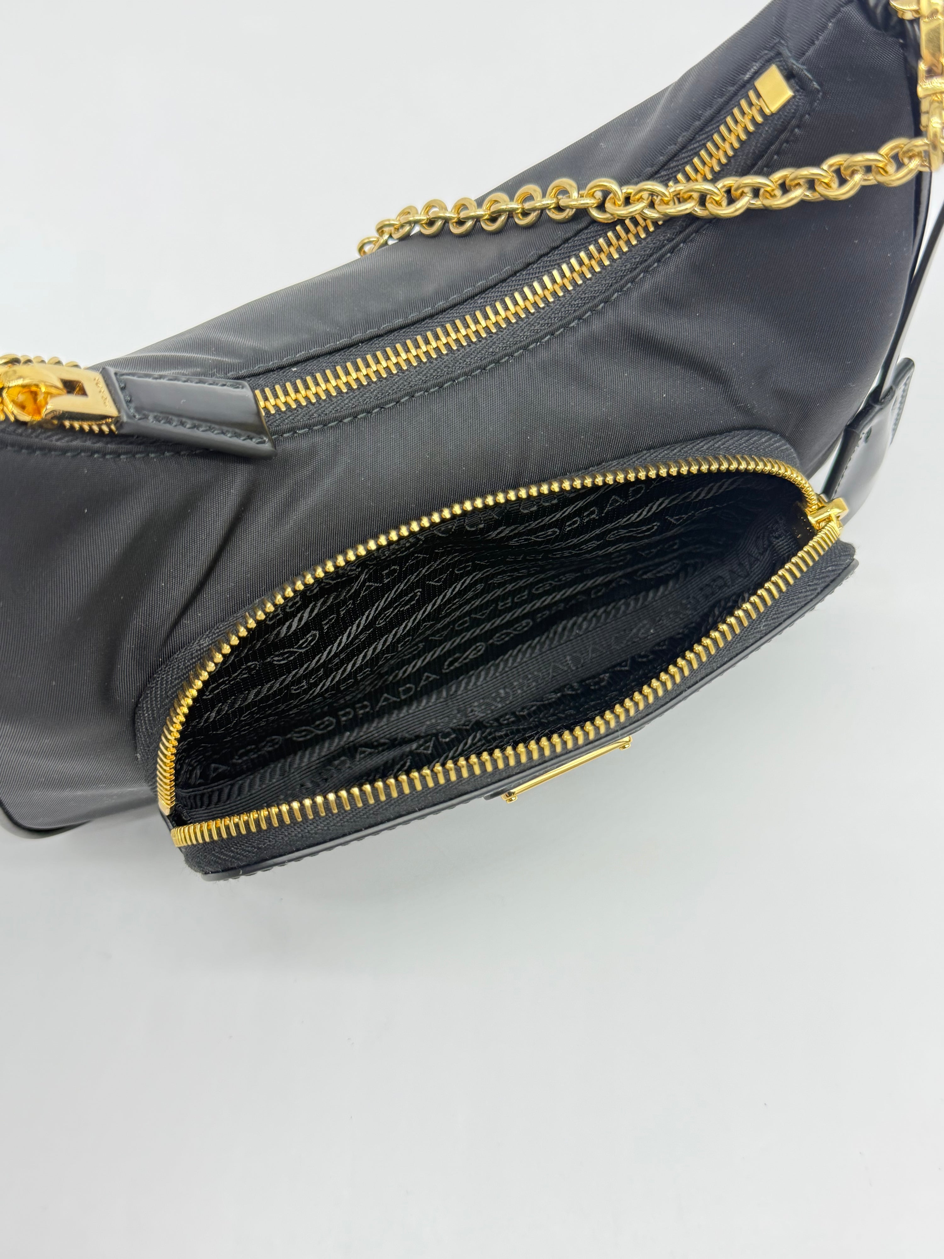 Prada Re-Edition Nylon e Pelle