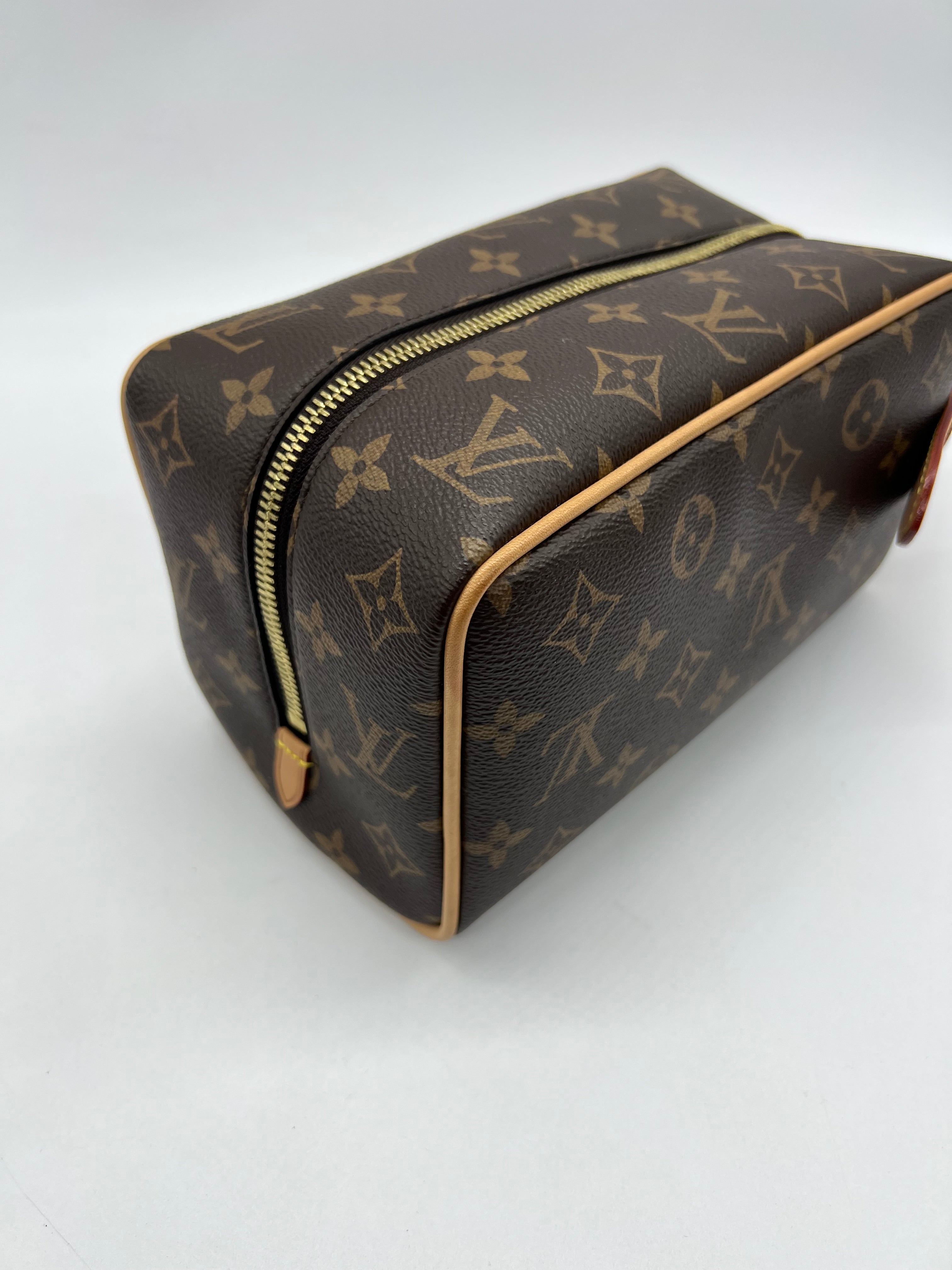 Louis Vuitton Trousse Toilette Locker Dopp Kit